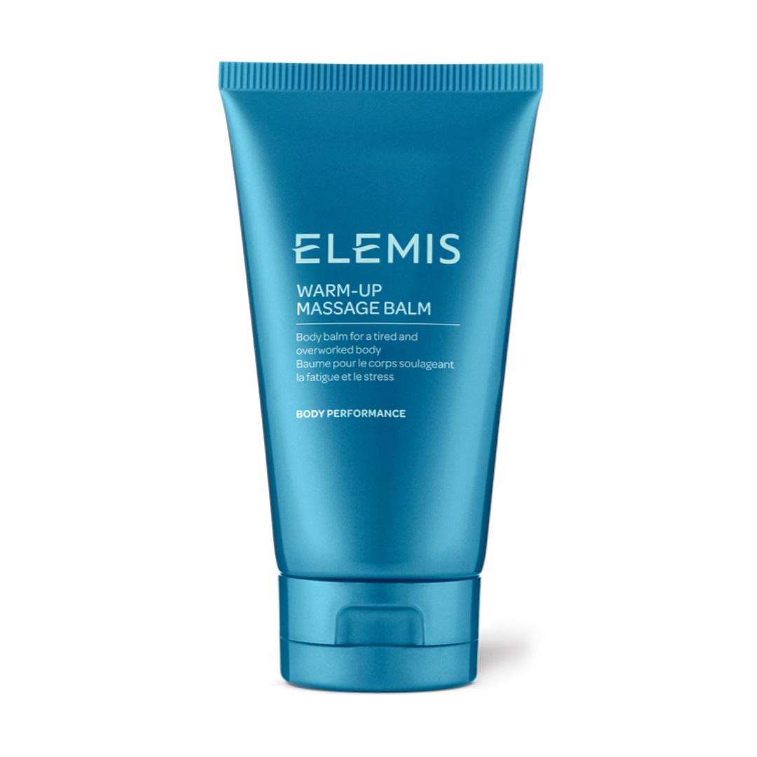 A blue tube of ELEMIS - WARM UP MASSAGE BALM by ELEMIS - STEINER. The text on the tube states that this soothing massage balm is for a tired and overworked body, relieving fatigue and stress. Infused with natural oils, it’s perfect for your post-exercise routine. The tube has a secure flip-top lid for easy dispensing.