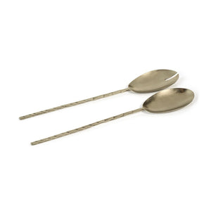 Displayed are two elegant, long-handled servers from the ZODAX TWISTED HAMMERED PEWTER collection. One is a traditional serving spoon, and the other is a slotted serving spoon with a notch at the top. Both feature a textured, twisted design on the handles. Dimensions vary slightly with each size for versatile use in your kitchen.