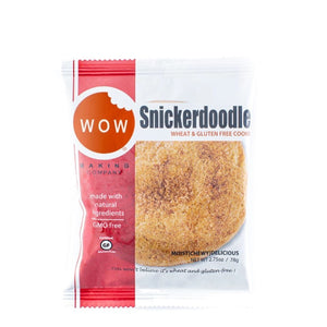 A packaged WOW Baking Company Gluten Free Snickerdoodle Cookie. The packaging is mostly clear with a red stripe on the left, featuring text that describes the cookie as wheat and gluten-free, made with natural ingredients, and GMO-free. Tantalizing cinnamon and sugar blend together for a tasty dessert visible through the package.